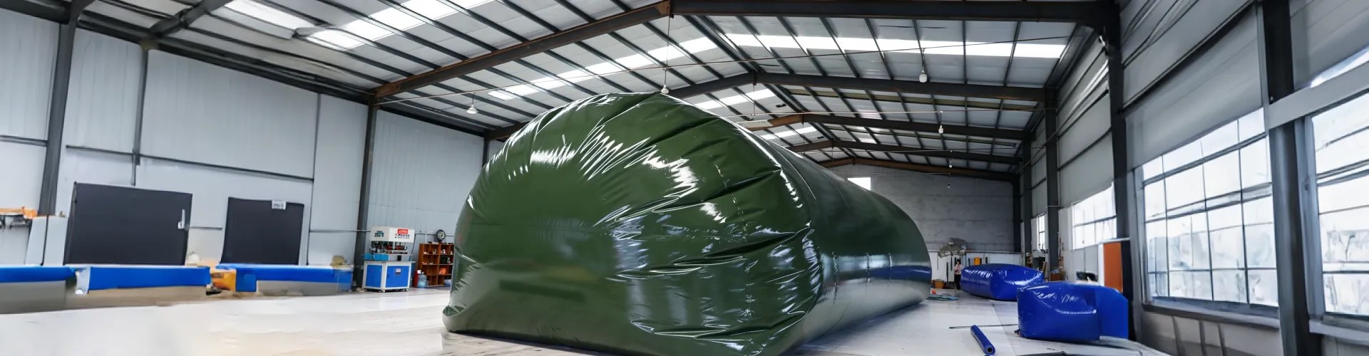 Large flexible water storage bladder in a modern factory